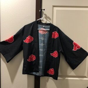 Source Unknown Black and Red Cape